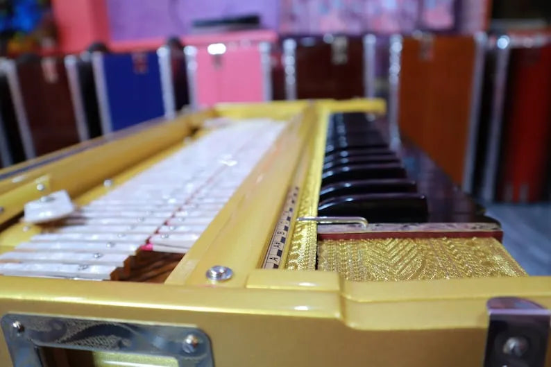 side close view of Premium Luxury golden 3 Line 9 Scale Changer Harmonium with Built-in Shruti Box - National Music India